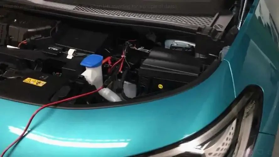 Close-up of a Kia EV6 dashboard display showing battery range and charge level after cold storage