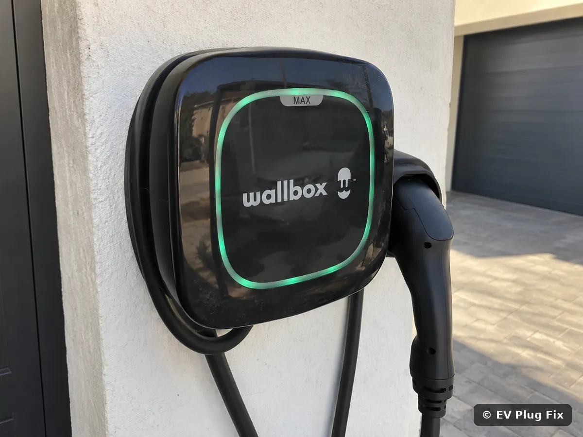 Wallbox Pulsar Max EV charger mounted on an exterior wall